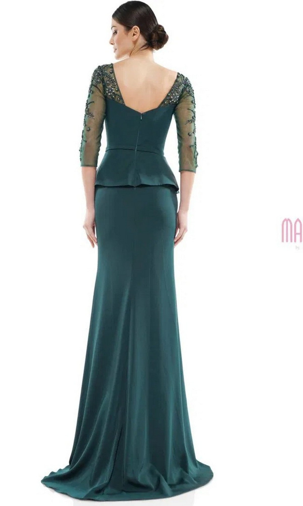 A woman is seen from the back against a white background, wearing the Marsoni MV1037 long formal dress—a dark teal, floor-length embellished trumpet gown with sheer beaded three-quarter sleeves and a fitted peplum waist.